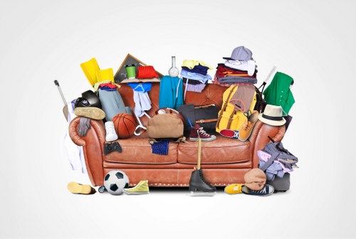 Professionals performing loft clearance in a Marylebone home