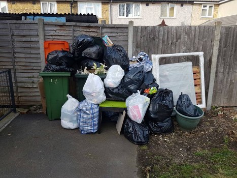 Professional team clearing a living room in Marylebone