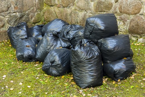 Workers sorting recyclable materials at a Marylebone facility
